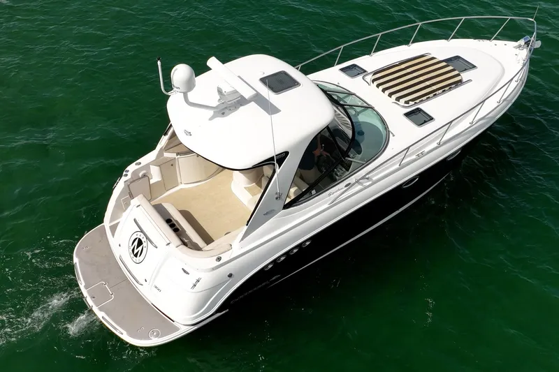 Slide: The Image of 2008 Chaparral Signature 350 yacht cruising on clear green water. - 29