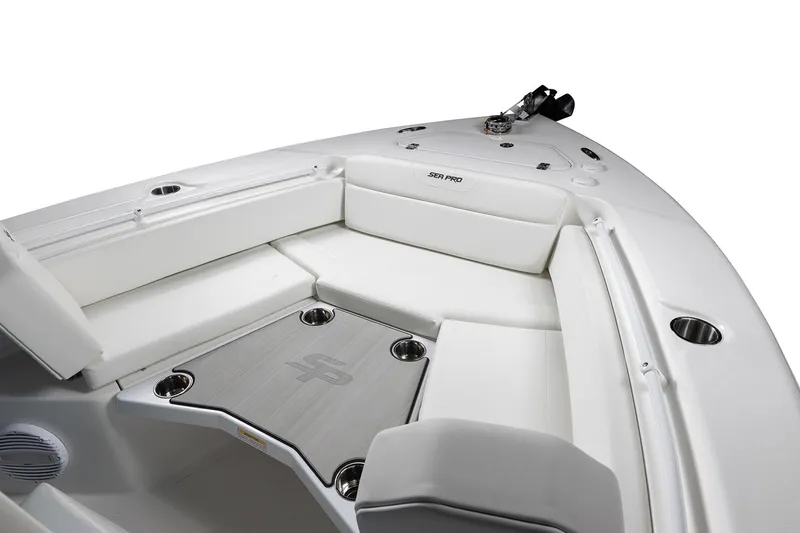 Slide: The Image of Manufacturer Provided Image: 2025 Sea Pro 225FLX Sandbar boat interior with white seating and cup holders. - 12