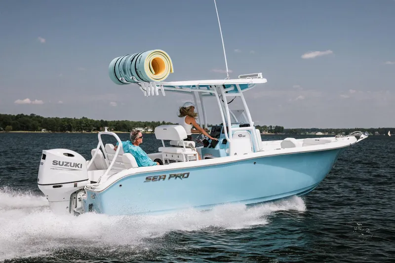 Slide: The Image of Manufacturer Provided Image: 2025 Sea Pro 225FLX Sandbar boat cruising on water with passengers. - 9