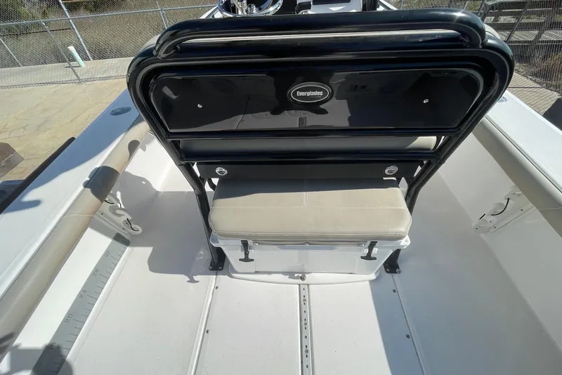 Slide: The Image of 2019 Everglades 243 Center Console boat interior with seating and storage. - 15