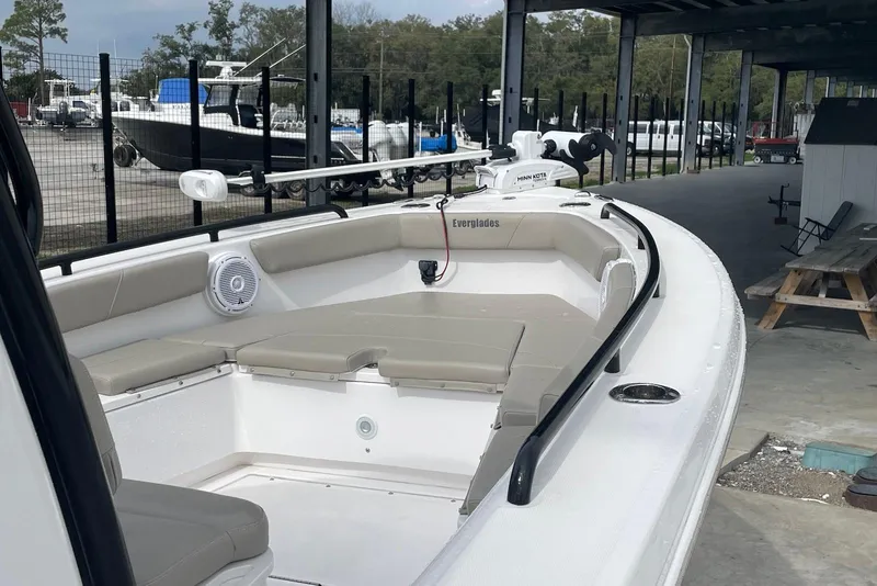 Slide: The Image of 2019 Everglades 243 Center Console boat with spacious seating and modern design. - 7