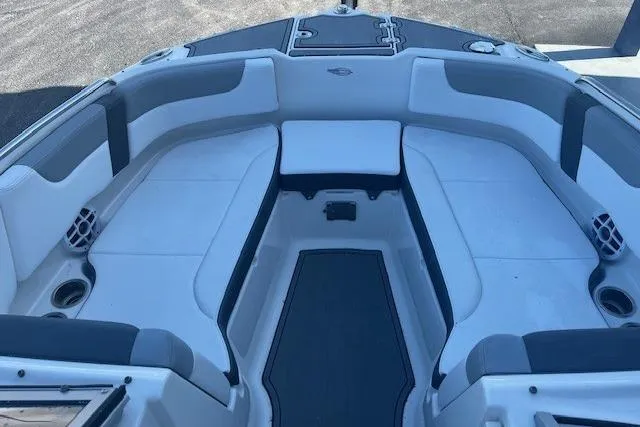 Slide: The Image of 2021 Chaparral 230 Suncoast boat interior with spacious seating and modern design. - 4