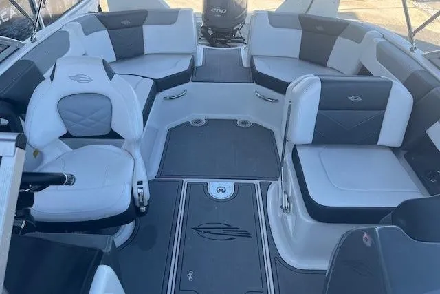 Slide: The Image of 2021 Chaparral 230 Suncoast boat interior with stylish seating and modern design. - 6