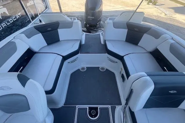 Slide: The Image of Interior view of 2021 Chaparral 230 Suncoast boat with spacious seating and modern design. - 7
