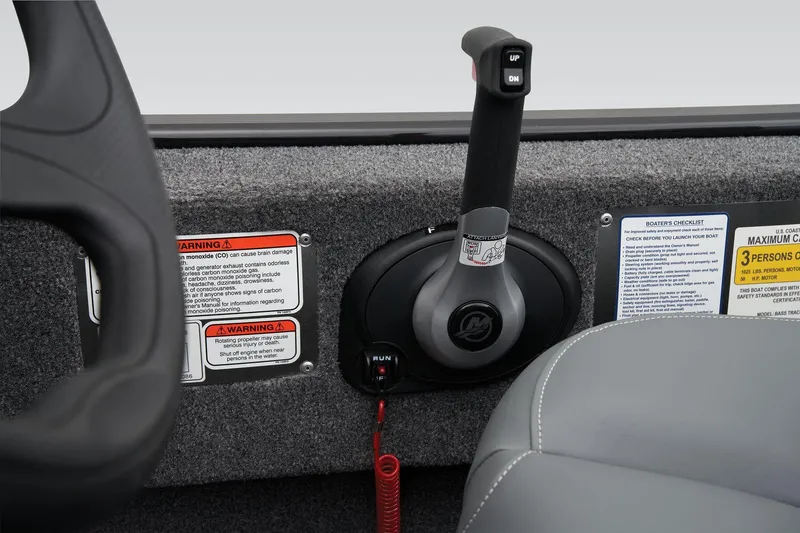 Slide: The Image of Manufacturer Provided Image: 2025 Tracker Bass Tracker Classic XL boat control panel with throttle and warning labels. - 20