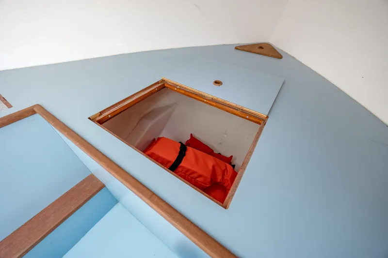 Slide: The Image of Interior storage compartment of 2019 Gamefisherman 26 Cuddy Cabin with life jackets. - 43