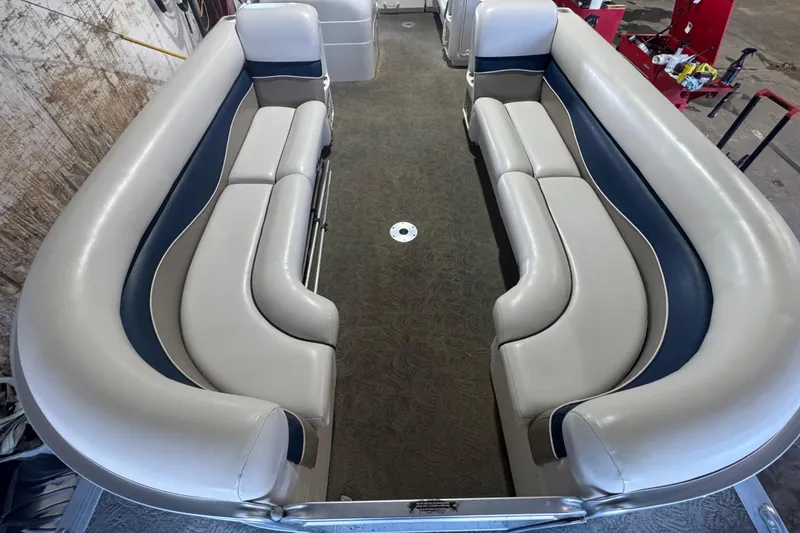 Slide: The Image of 2005 Harris FloteBote 260 Classic pontoon boat interior with plush seating. - 5