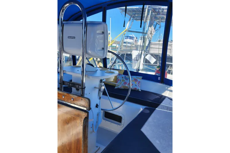 Slide: The Image of Cockpit of 1987 Irwin 44 sailboat with steering wheel and NavPod. - 10