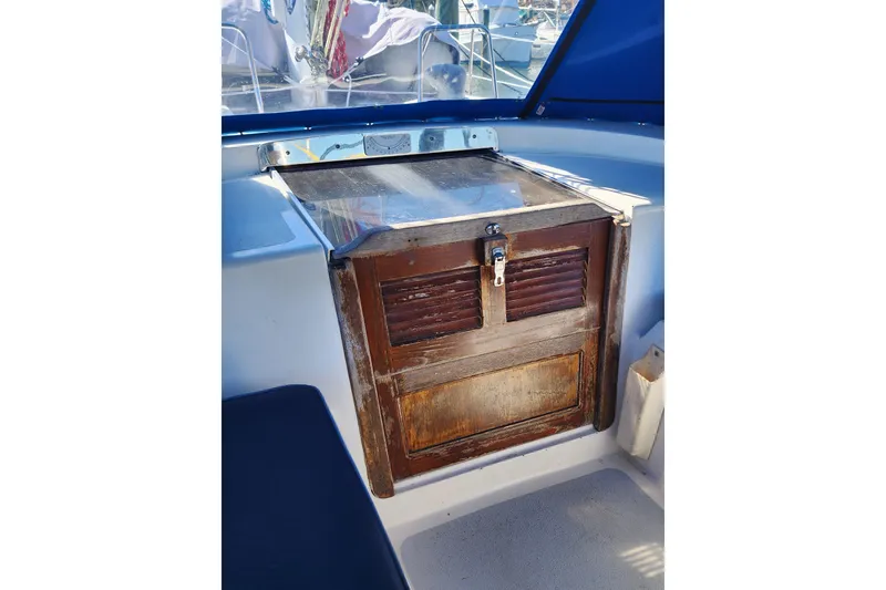 Slide: The Image of Cockpit of 1987 Irwin 44 sailboat with wooden hatch and lock. - 19