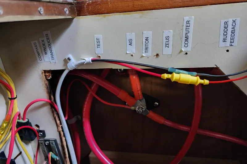 Slide: The Image of Electrical panel with labeled wires in a 1987 Irwin 44 sailboat. - 37