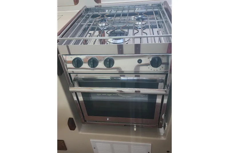 Slide: The Image of Stainless steel marine stove and oven in 1987 Irwin 44 yacht galley. - 54