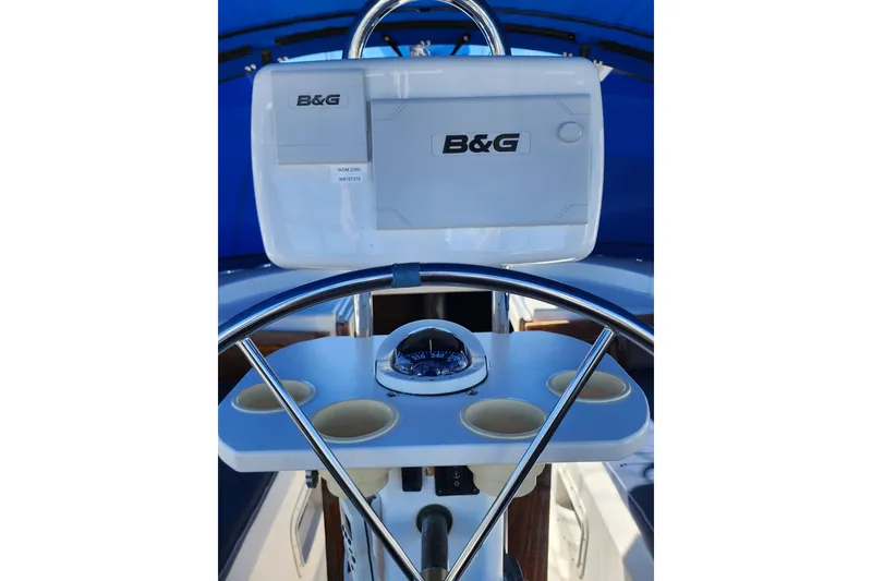 Slide: The Image of Steering wheel and navigation system on 1987 Irwin 44 sailboat. - 8