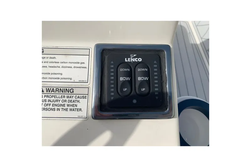 Slide: The Image of Control panel on 2017 Pathfinder 2400 TRS boat with Lenco trim tab switches. - 21
