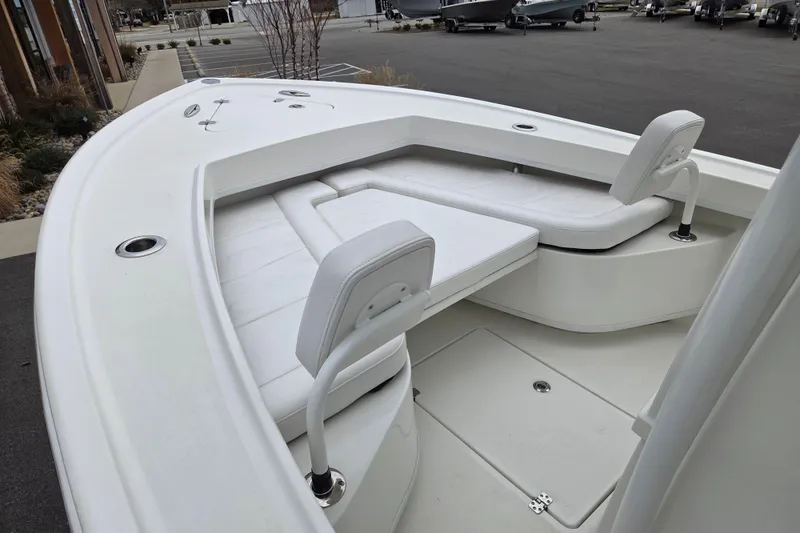 Slide: The Image of 2026 Pair Customs 21 Center Console MV boat with white seating and deck. - 5