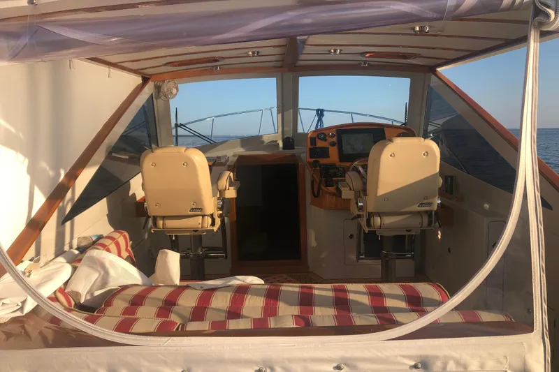 Slide: The Image of 2005 Lyman-Morse Monhegan yacht interior with helm, seating, and ocean view. - 10