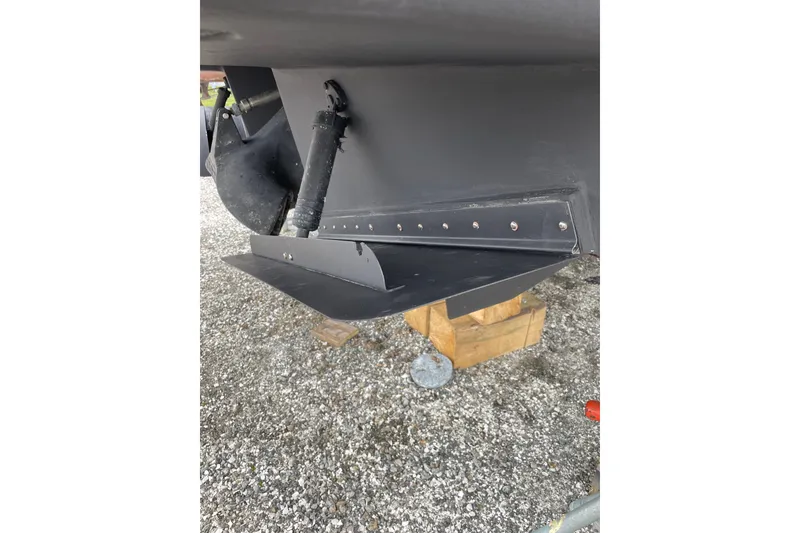 Slide: The Image of Close-up of 2005 Lyman-Morse Monhegan boat's trim tab and hydraulic system. - 5