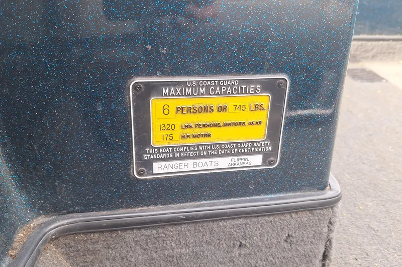 Slide: The Image of 1994 Ranger 481VS capacity plate, 6 persons or 745 lbs, U.S. Coast Guard compliant. - 17