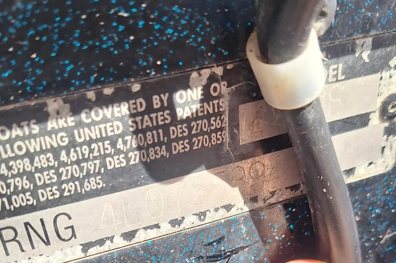 Slide: The Image of 1994 Ranger 481VS boat patent label with serial number and cable. - 18