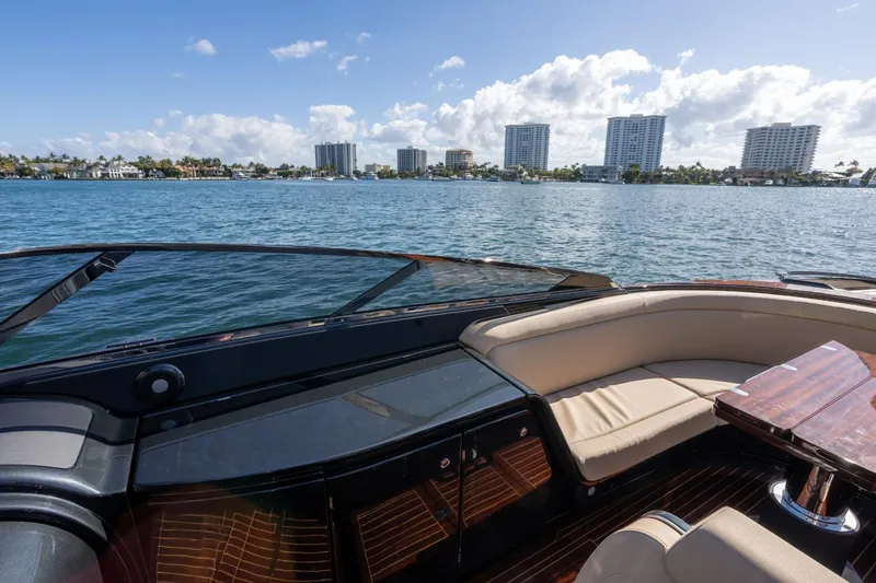 Slide: The Image of Luxurious 2025 Riva 33' Aquariva Special yacht interior with waterfront cityscape view. - 17