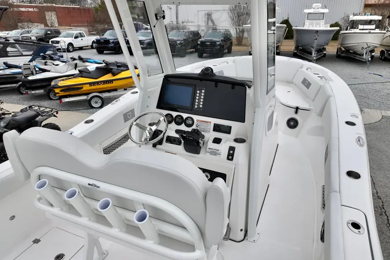 Slide: The Image of 2026 Sea Fox 268 Commander boat interior with steering console and seating. - 21