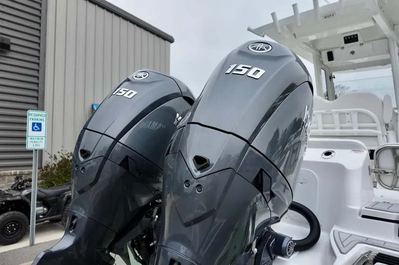 Slide: The Image of Twin Yamaha 150 engines on a 2026 Sea Fox 268 Commander boat. - 22