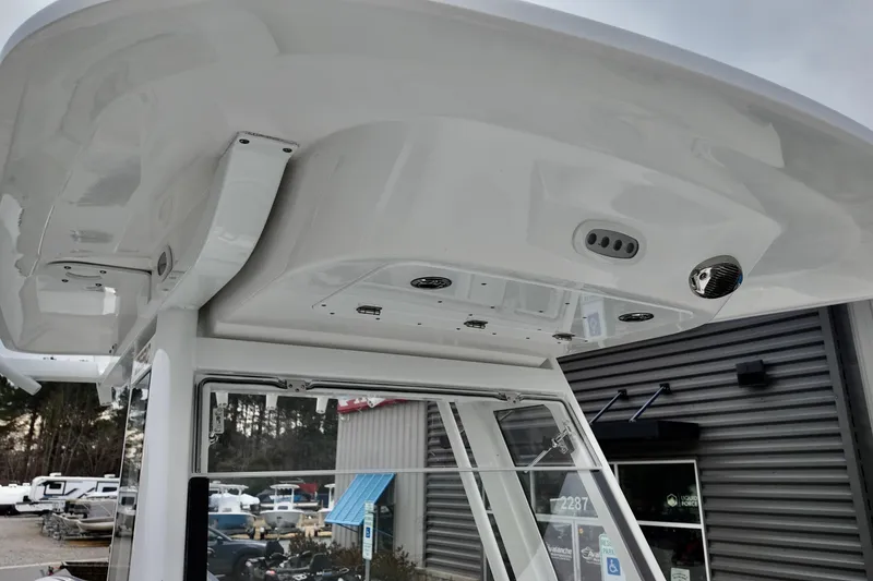 Slide: The Image of 2026 Sea Fox 268 Commander boat's helm station with modern features and sleek design. - 4