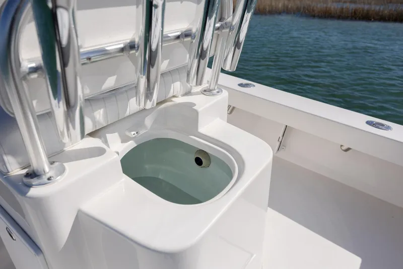 Slide: The Image of 2024 Layton Bay 22 boat with a built-in livewell on deck. - 13