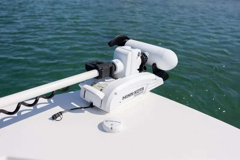 Slide: The Image of Minn Kota Terrova trolling motor on 2024 Layton Bay 22 boat, on calm water. - 19
