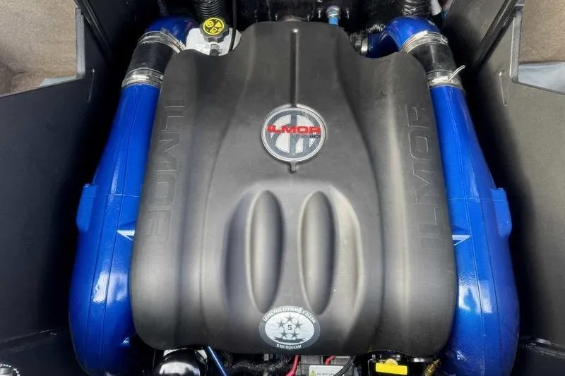 Slide: The Image of 2024 MasterCraft X24 Ilmor engine with blue accents, top view. - 15