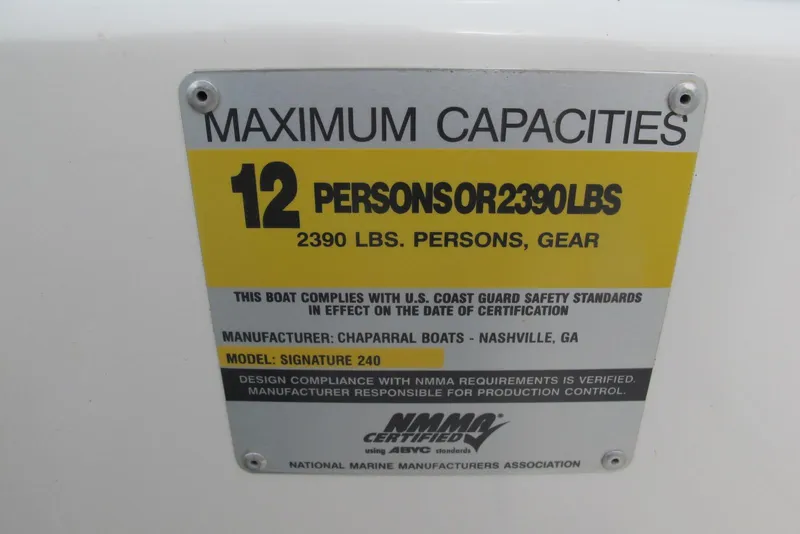 Slide: The Image of Capacity label for Chaparral Signature 240, 2006: 12 persons or 2390 lbs. - 16