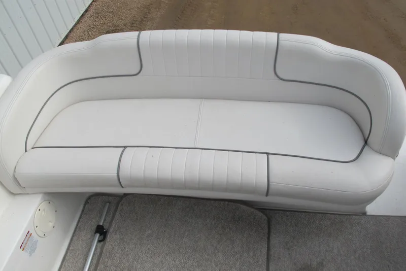 Slide: The Image of White leather seating on 2006 Chaparral Signature 240 boat, featuring elegant stitching. - 9