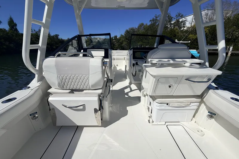 Slide: The Image of 2026 World Cat 265 DC-X boat interior with seating and storage compartments. - 10