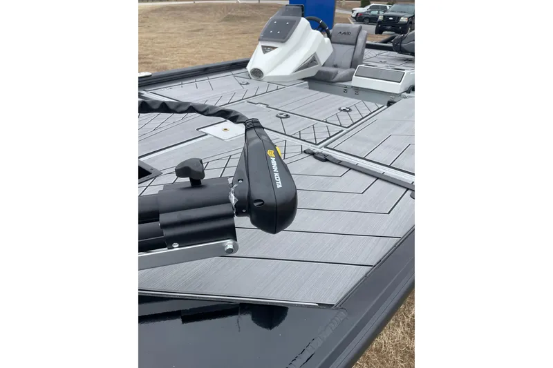 Slide: The Image of 2026 Avid 18 Vertex boat deck with Minn Kota trolling motor, gray seating, and modern design. - 10