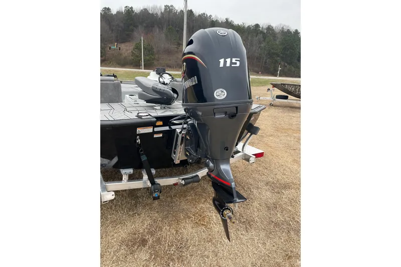 Slide: The Image of 2026 Avid 18 Vertex boat with Yamaha 115 outboard motor on trailer. - 3