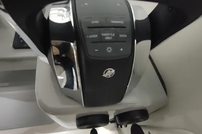 Slide: The Image of Control panel of 2015 Boston Whaler 285 Conquest boat, featuring various operational buttons. - 16