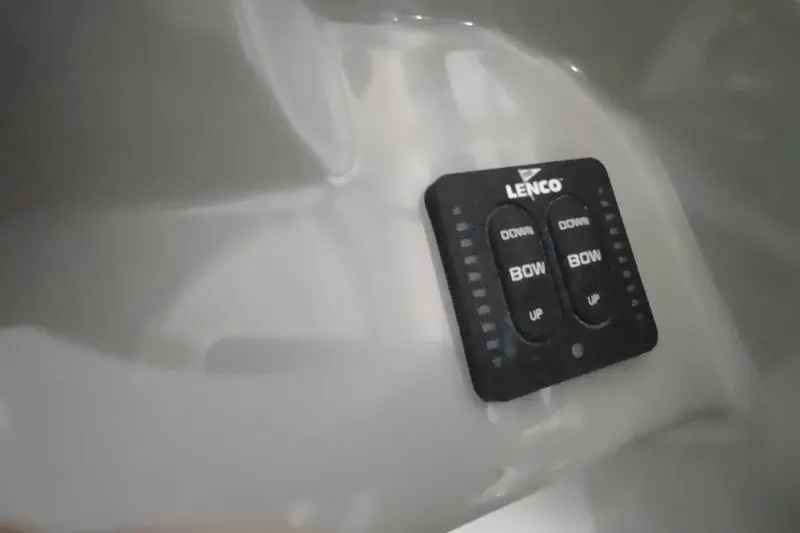 Slide: The Image of Lenco trim tab control panel on 2015 Boston Whaler 285 Conquest boat. - 20