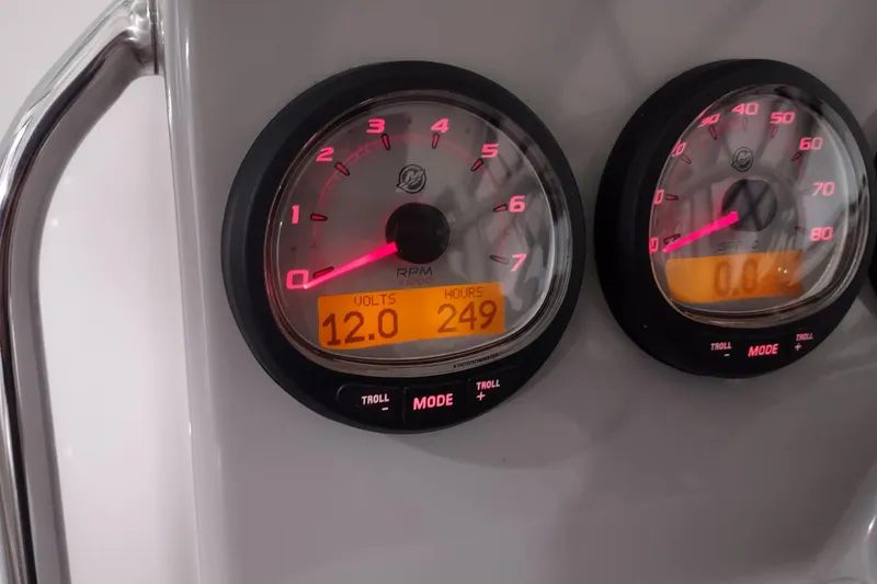 Slide: The Image of Close-up of Boston Whaler 285 Conquest 2015 boat gauges displaying volts and hours. - 22