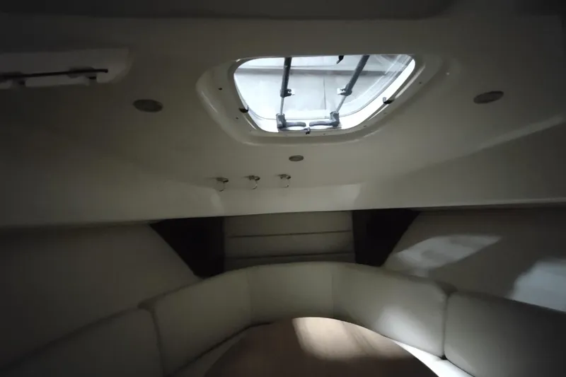 Slide: The Image of Interior cabin of 2015 Boston Whaler 285 Conquest with skylight and seating area. - 45