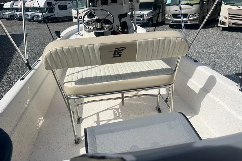Slide: The Image of 2019 Carolina Skiff 18 JVX SS boat interior with seating and steering wheel. - 9