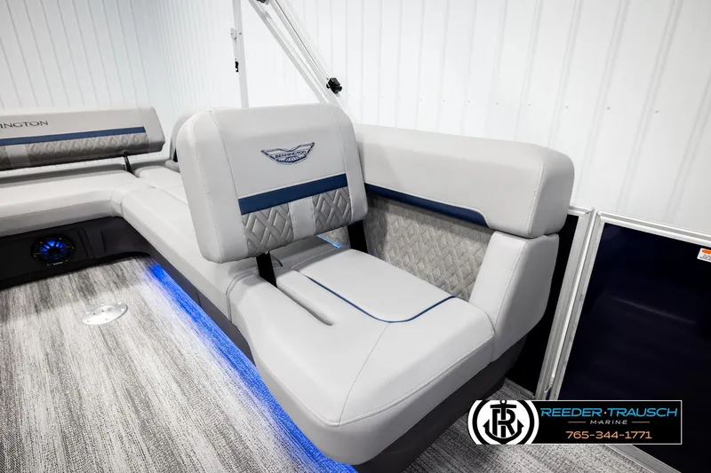 Slide: The Image of 2026 Bennington MLSF boat interior with luxurious seating and ambient lighting. - 25
