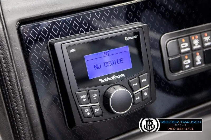 Slide: The Image of 2026 Bennington MLSF boat dashboard with Rockford Fosgate Bluetooth stereo system. - 34