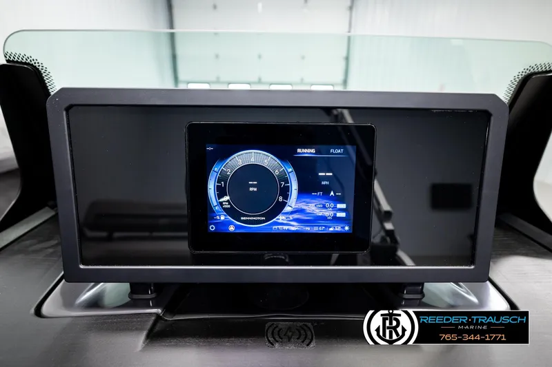 Slide: The Image of 2026 Bennington MLSF dashboard display with digital RPM gauge and navigation controls. - 37