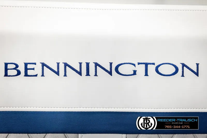 Slide: The Image of 2026 Bennington MLSF boat seat with embroidered logo and Reeder-Trausch Marine contact details. - 43