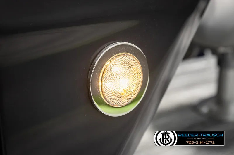 Slide: The Image of 2026 Bennington MLSF boat light detail with Reeder-Trausch Marine logo. - 45