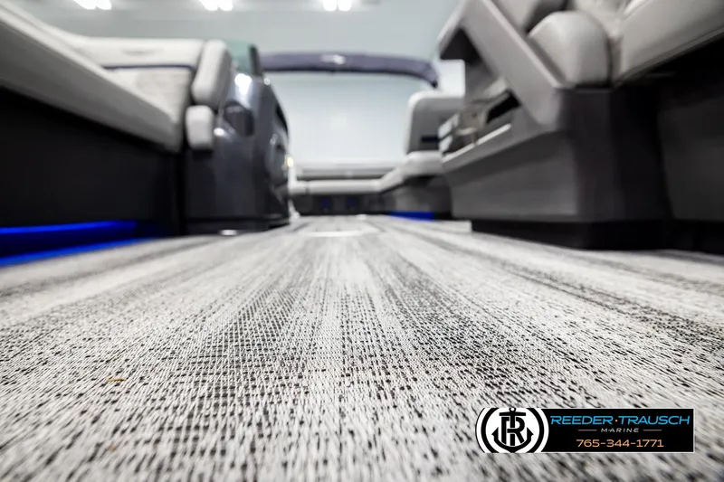 Slide: The Image of Interior view of 2026 Bennington MLSF boat with modern seating and textured flooring. - 47