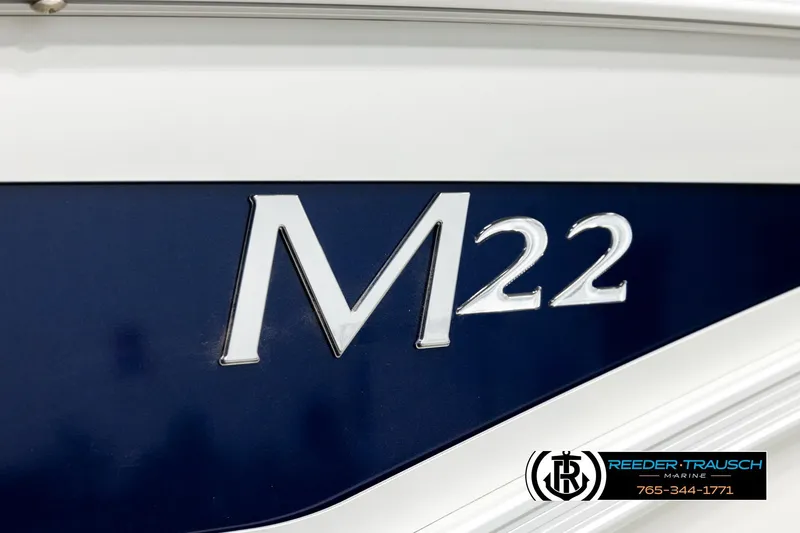 Slide: The Image of 2026 Bennington MLSF boat with M22 emblem, Reeder-Trausch Marine branding. - 50