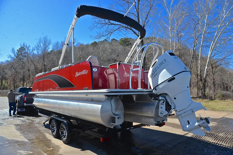 Slide: The Image of 2023 Silver Wave 2210 SW5 RLP pontoon boat with Suzuki outboard motor on trailer. - 12