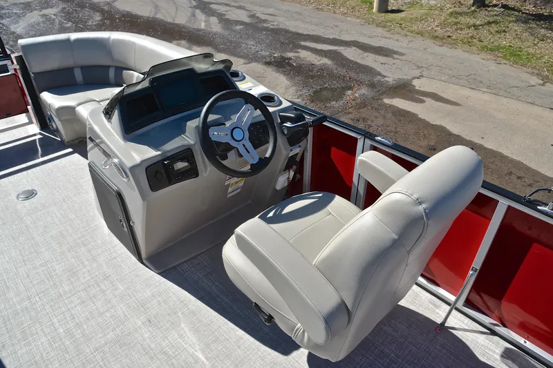 Slide: The Image of 2023 Silver Wave 2210 SW5 RLP boat interior with steering console and seating. - 25