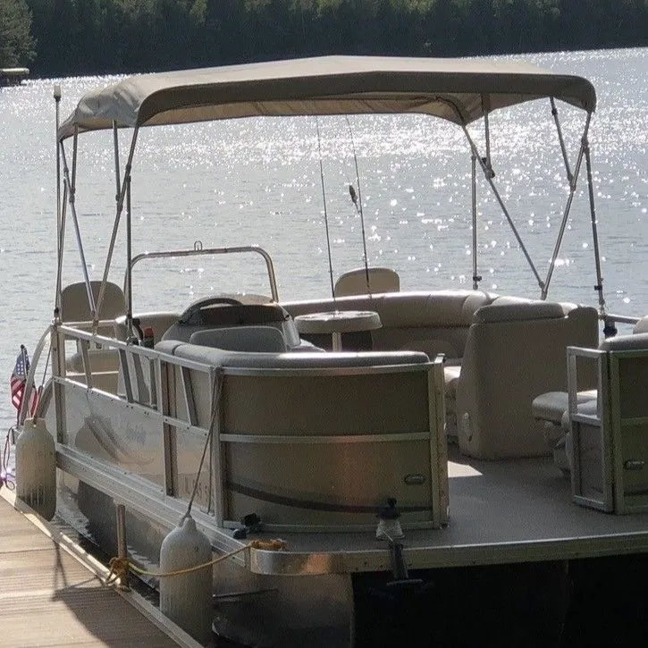 The Image of 2014 JC MFG SPIRIT 223TT FISH pontoon boat at dock. - 0