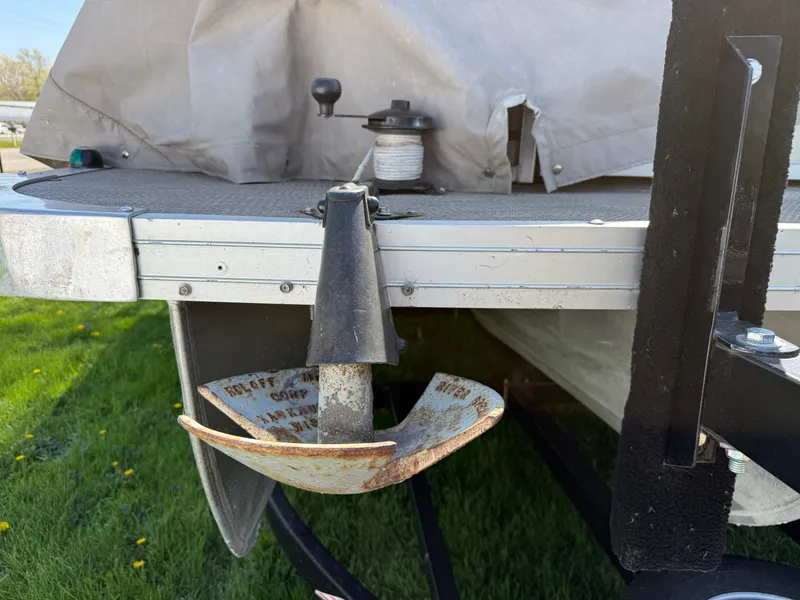 Slide: The Image of 2014 JC MFG SPIRIT 223TT FISH boat with anchor and cover. - 31